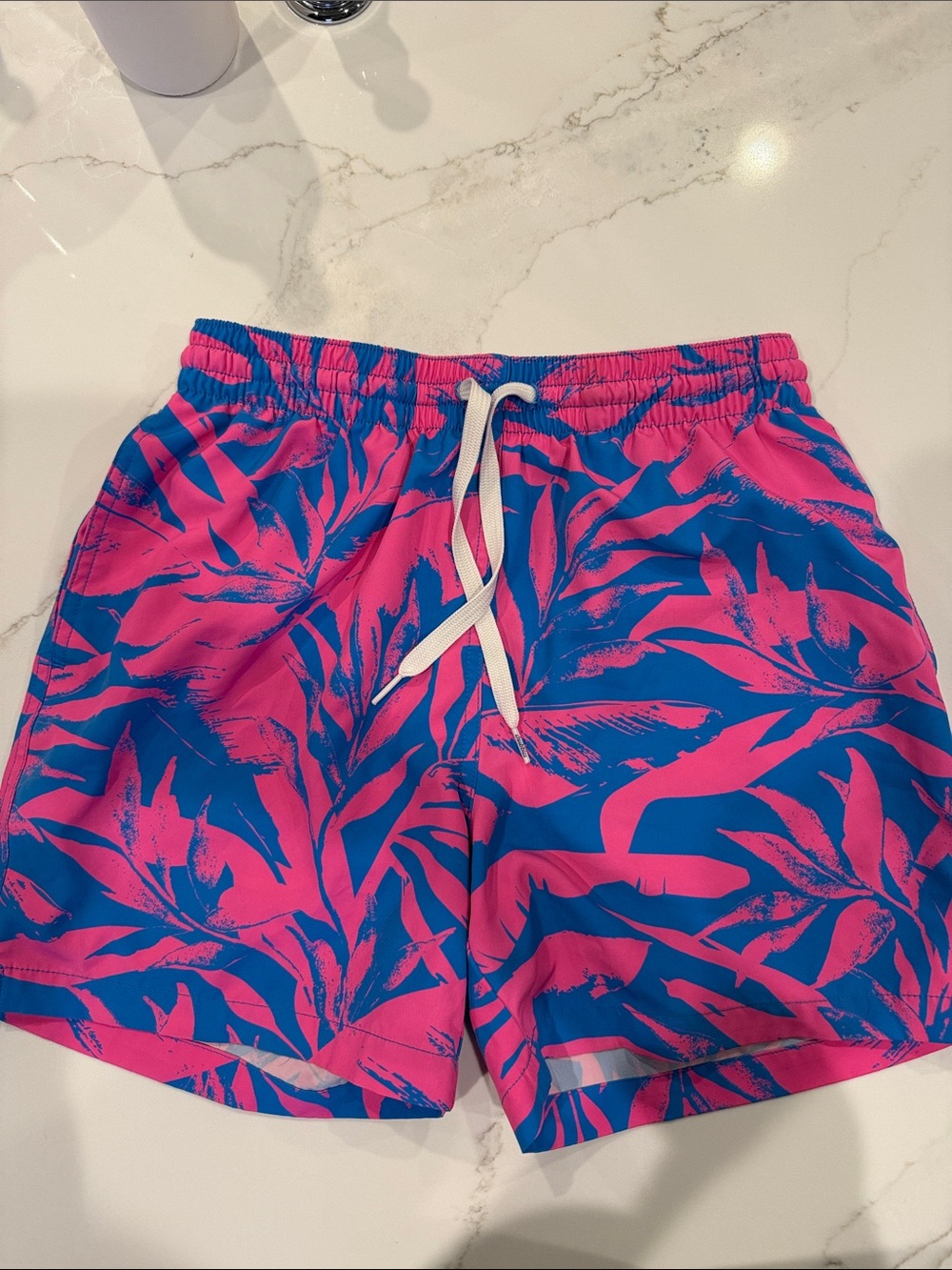 chubbies Kids Swim Trunks in Hot Pink and Royal Blue Tropical Leaf Print